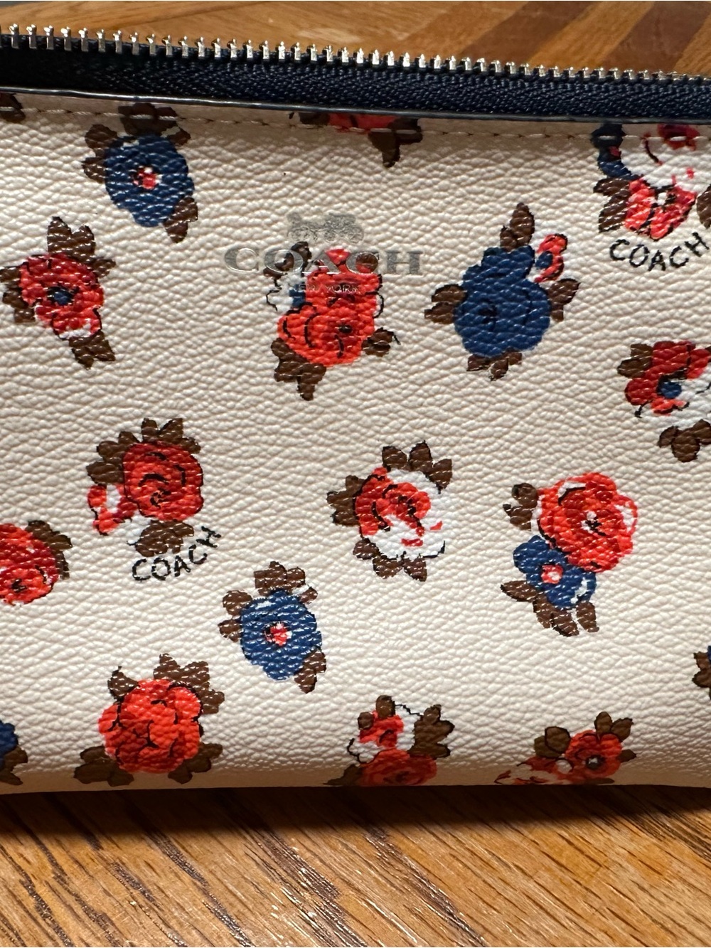 COACH 57596 CORNER ZIP WRISTLET IN TEA ROSE FLORAL PRINT COATED CANVAS